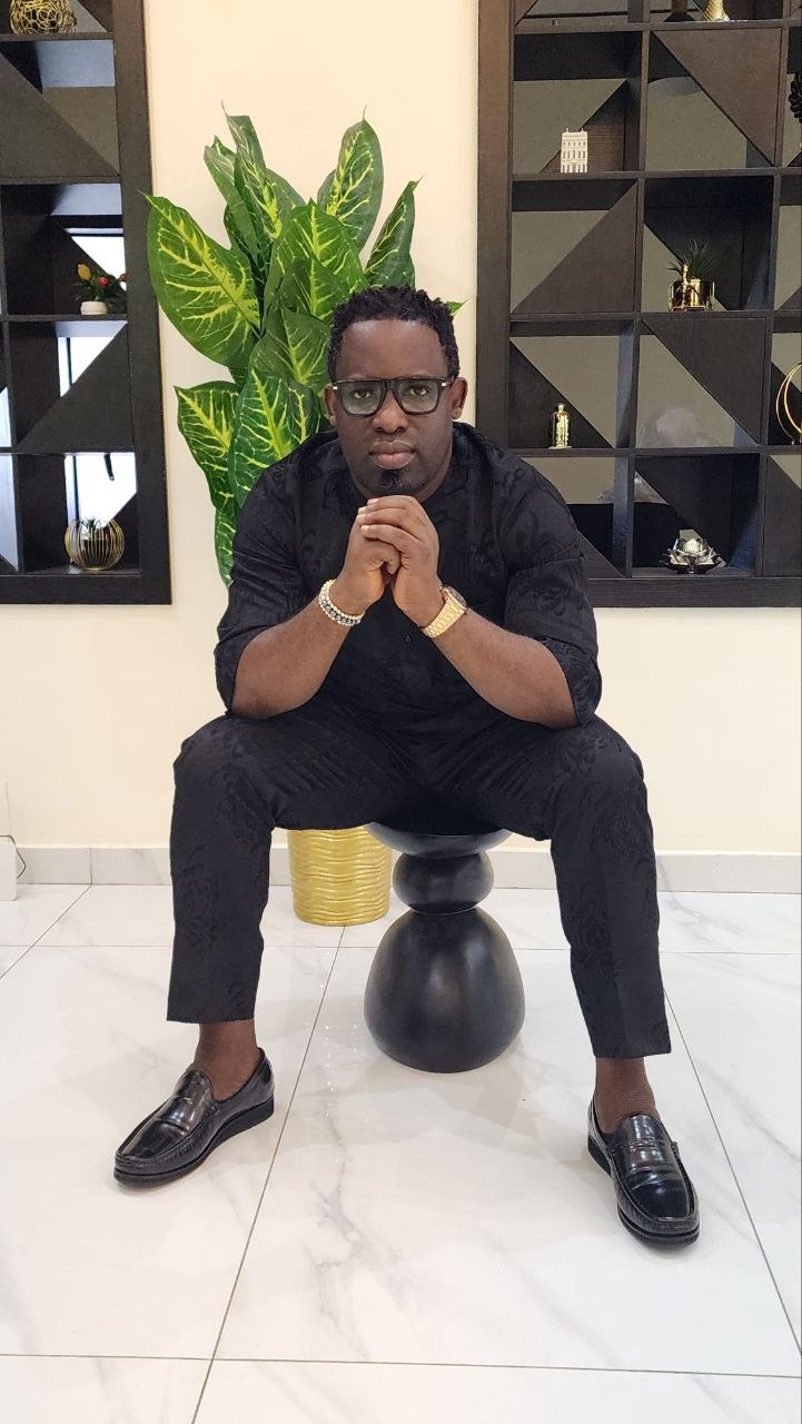 Dr. Abiodun seated executive portrait